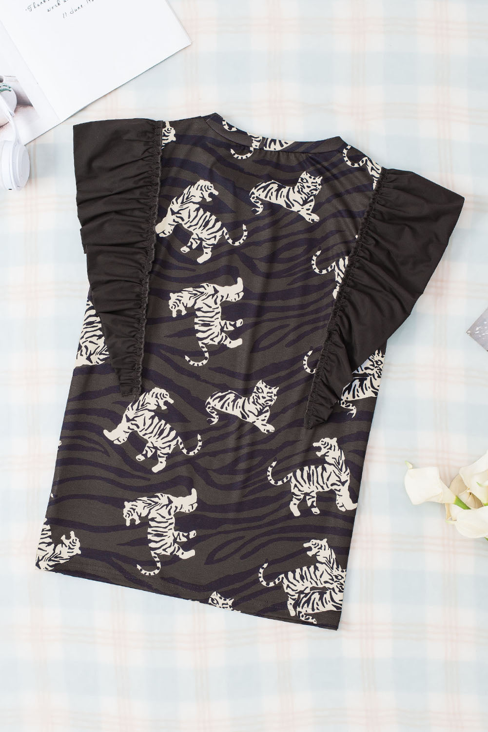 Schwarzes, stylisches Oberteil mit Rüschenärmeln und Animalprint