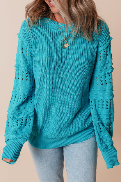Türkisfarbener Pullover mit gerüschten Ösenärmeln