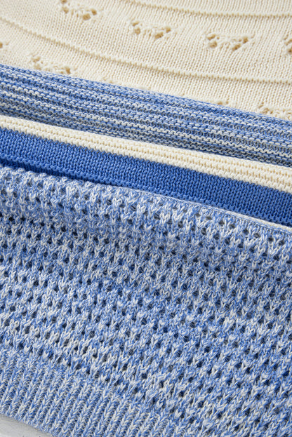 Hellblauer Pullover mit offenen Maschen und Puffärmeln