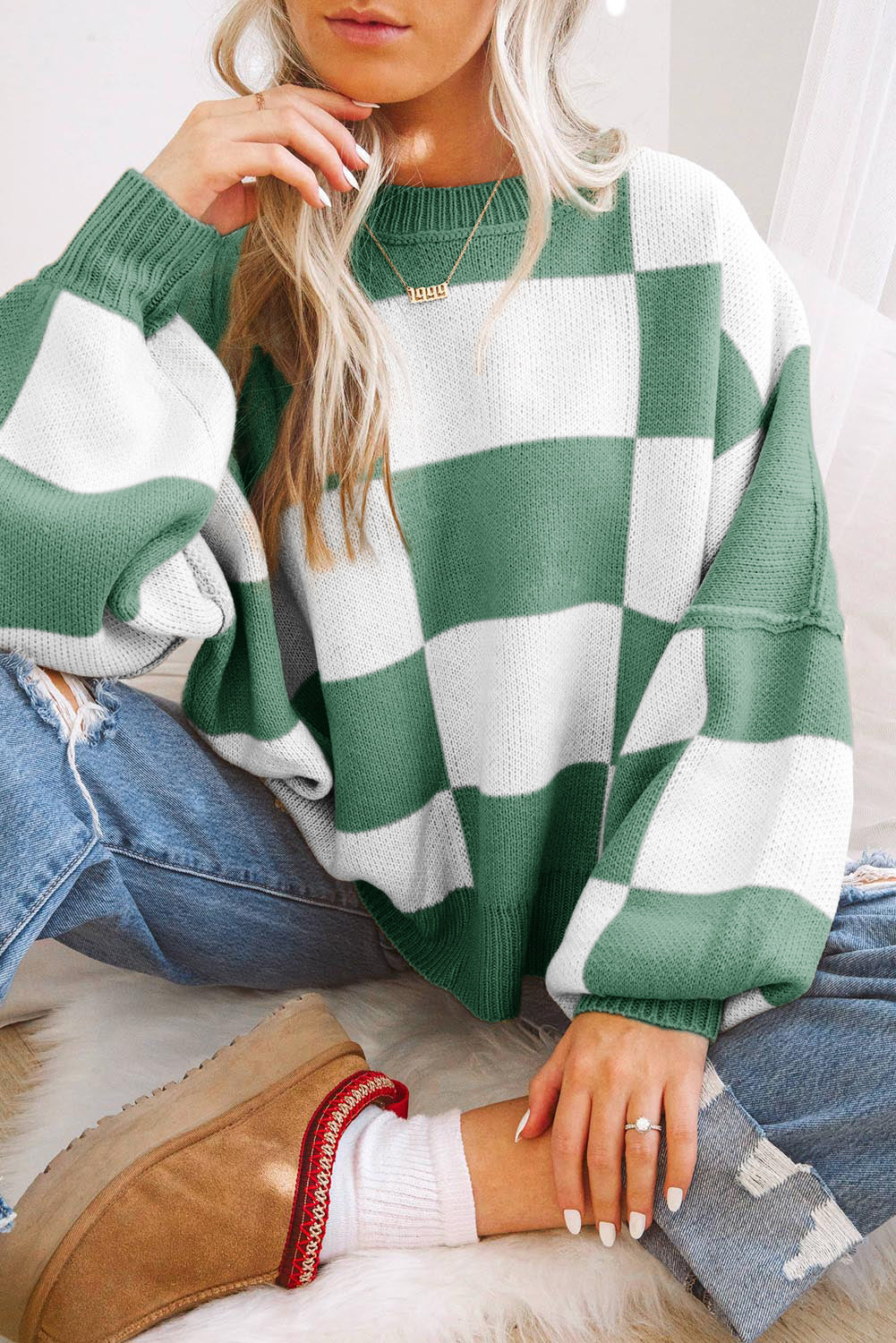 Grün karierter Pullover mit Bischofsärmeln