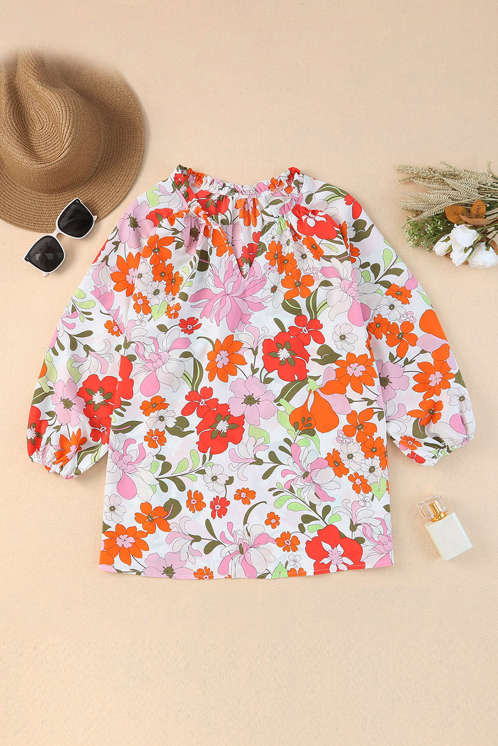 Orangefarbene Bluse mit Puffärmeln und Rüschenbesatz