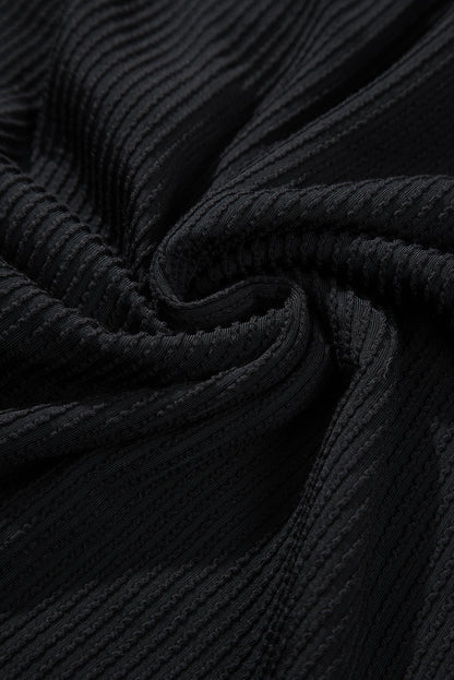 Schwarzes Shacket mit Kordel und aufgesetzter Brusttasche mit Pailletten