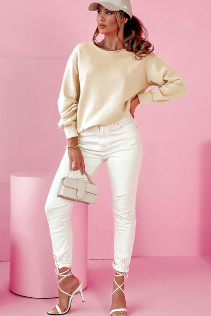 Aprikosenfarbenes Sweatshirt mit Rundhalsausschnitt und Schleife