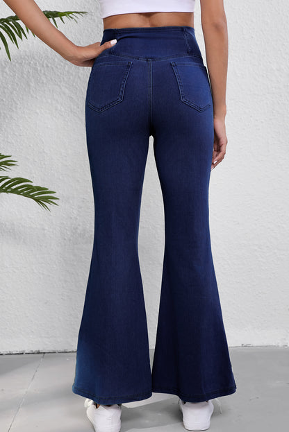 Dunkelblaue, einfarbige Schlagjeans mit gekreuzter High Waist