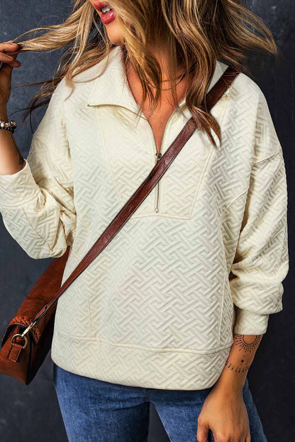 Beiges, einfarbiges Sweatshirt mit halbem Reißverschluss und Kragen