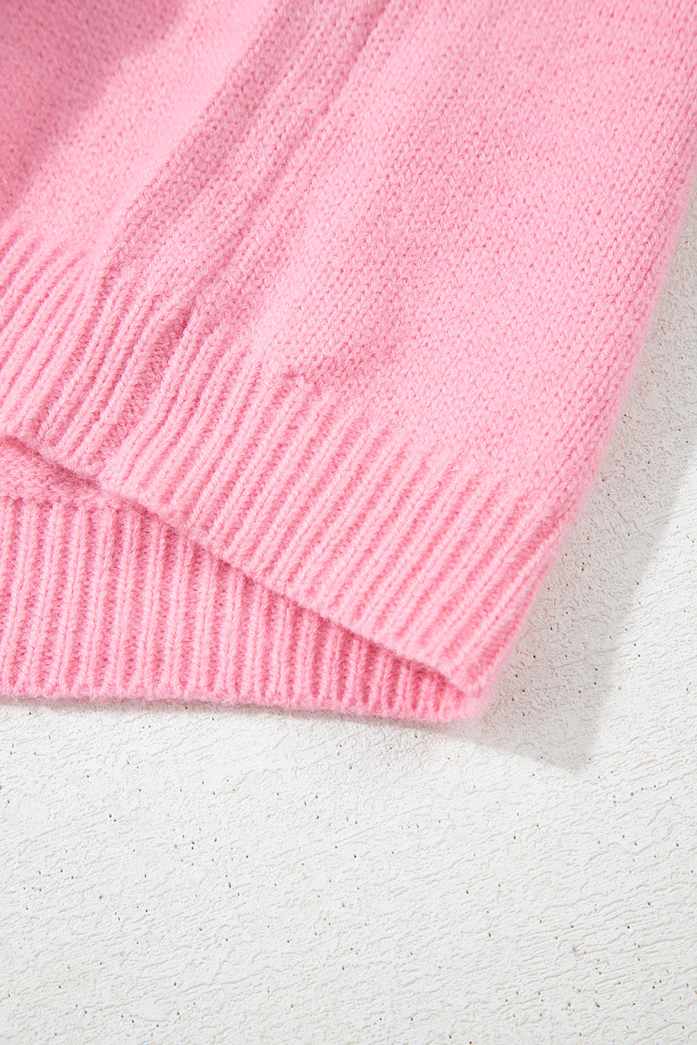 Niedliche Strickjacke mit Blumenmuster in Rosa