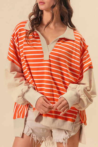 Orangefarbenes Sweatshirt mit Farbblockdesign und lockerer Passform, Kragen und überschnittenen Schultern