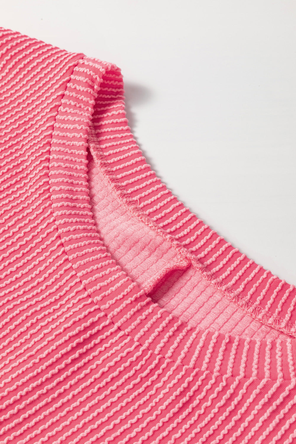 Peach Blossom – Geripptes, strukturiertes Langarm-T-Shirt in Übergröße