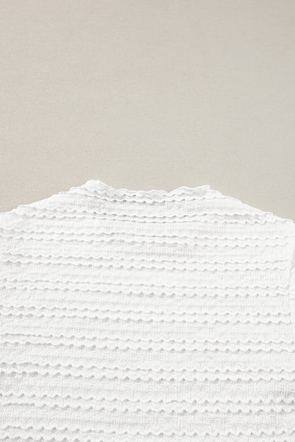 Weißes, schmal geschnittenes Jacquard-Strickoberteil
