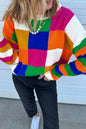Orange karierter Farbblock-Pullover mit Rundhalsausschnitt und lockerem Schnitt