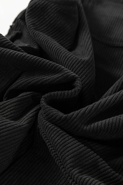 Schwarzes, einfarbiges, ärmelloses Cord-Overallkleid mit Fronttaschen