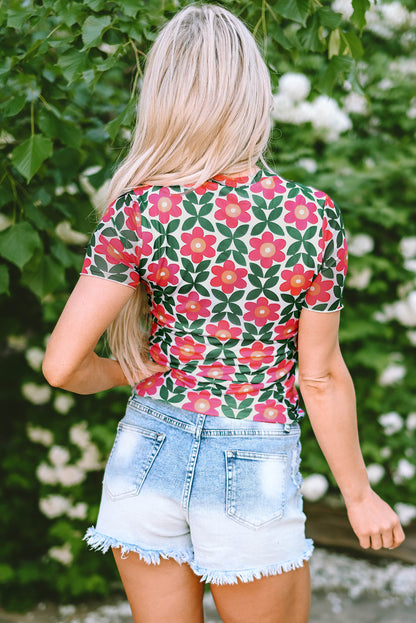 Feurig rotes T-Shirt mit Rundhalsausschnitt und Retro-Blumendruck