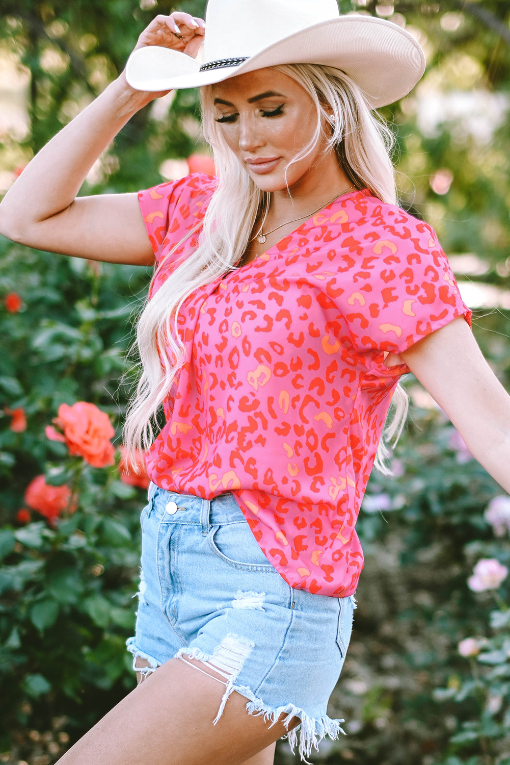 Rosa Bluse mit V-Ausschnitt und Leopardenmuster
