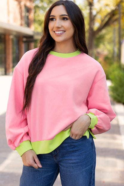 Rosa Sweatshirt mit Farbblock-Muster und Puffärmeln