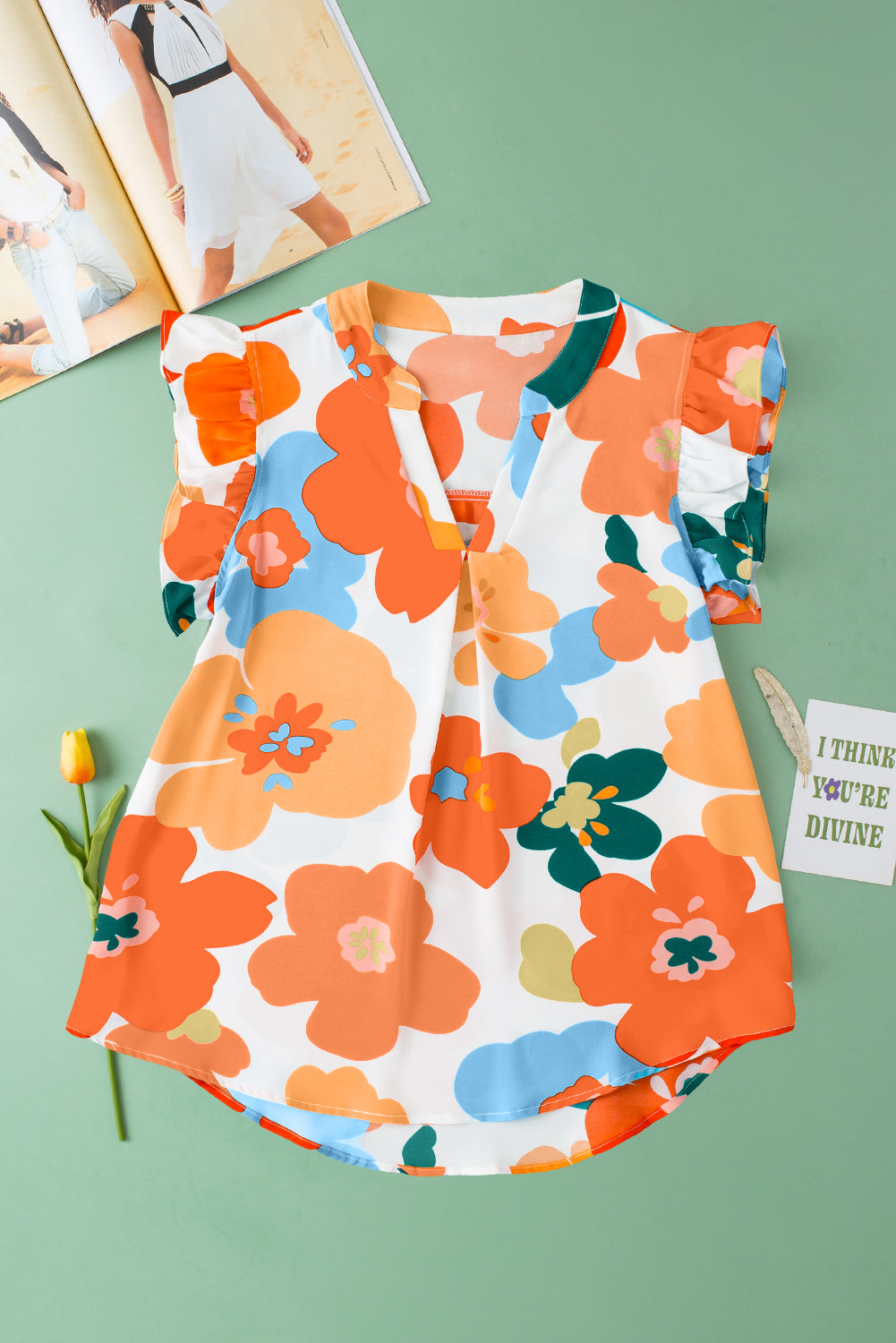 Orangefarbene Bluse mit Blumenmuster, V-Ausschnitt, Rüschenärmeln