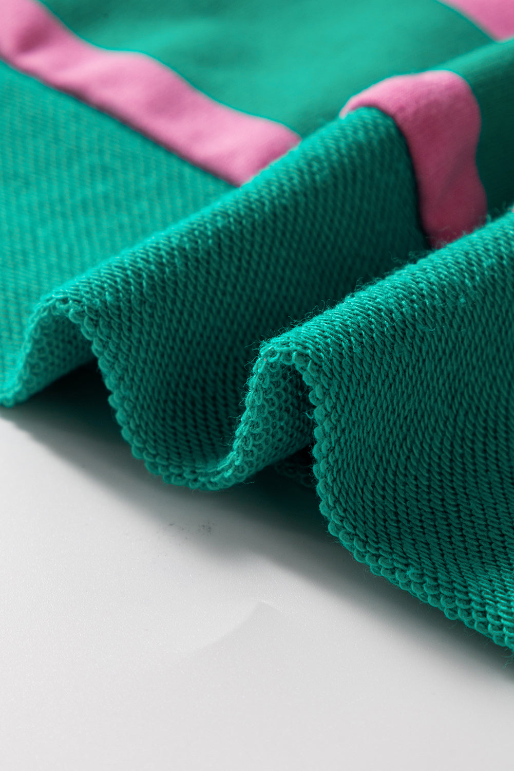 Rosa gestreiftes Stern-Patchwork-Pullover-Sweatshirt mit Rundhalsausschnitt