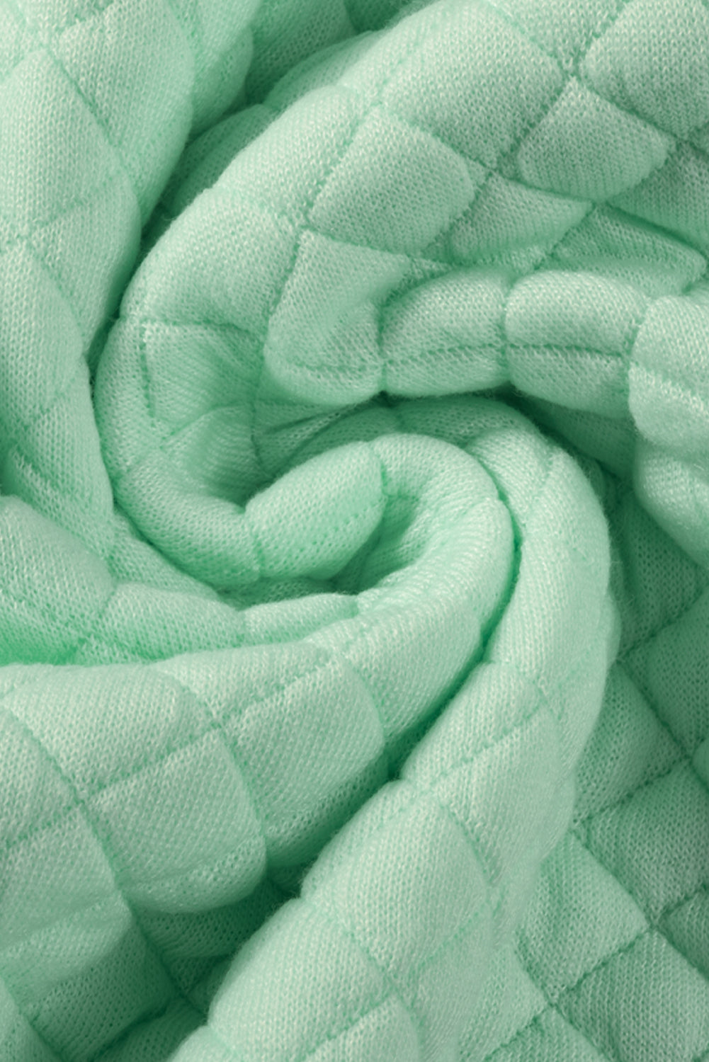 Grüne Steppjacke mit Patchwork-Patchwork-Klappentasche und Farbblock