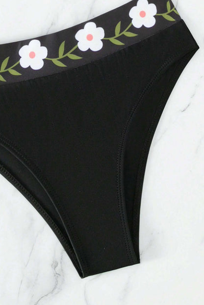 Schwarzer Neckholder-Badeanzug mit Blumenmuster und hoher Taille