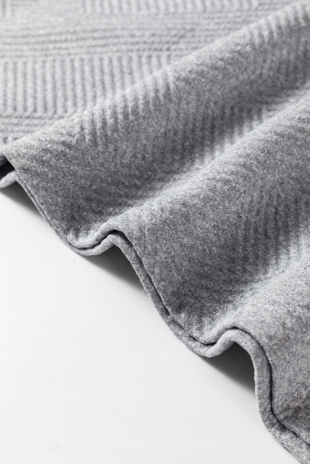 Graues, einfarbiges, strukturiertes Etuikleid mit langen Ärmeln