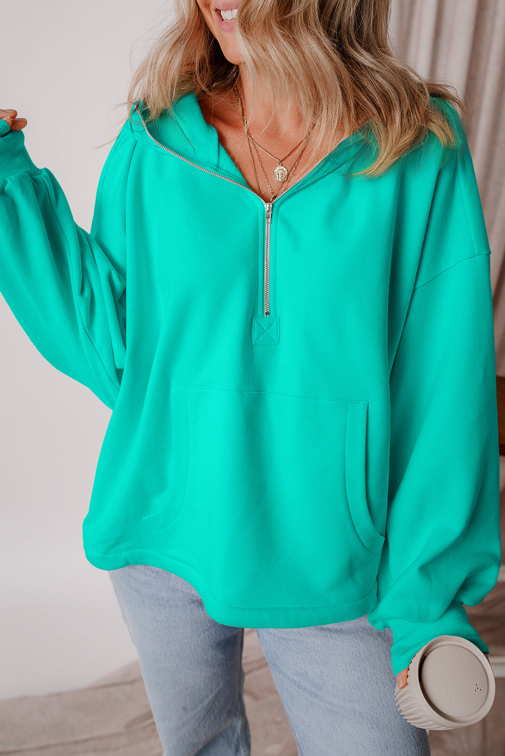 Aruba Blauer, lockerer Hoodie mit Fleecefutter und Kängurutaschen mit halbem Reißverschluss