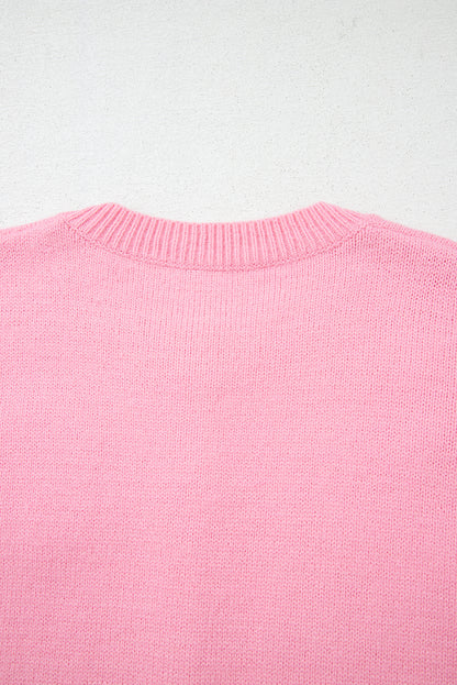 Niedliche Strickjacke mit Blumenmuster in Rosa