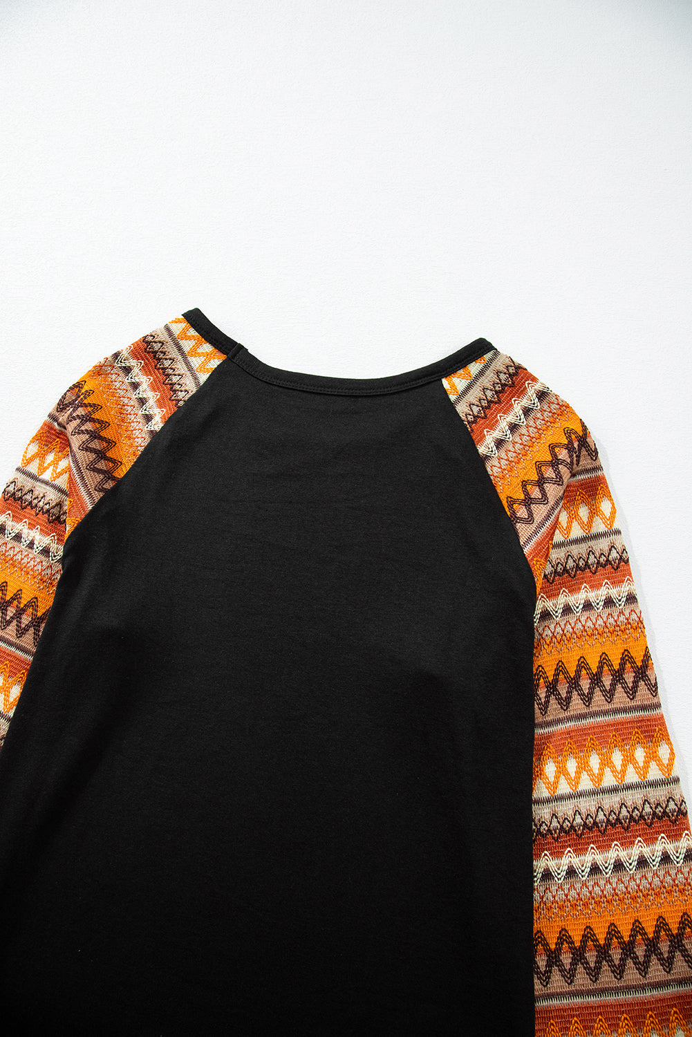 Oranges Raglan-Patchwork-Langarm-T-Shirt mit Geo-Print