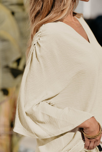 Parchment – Bluse mit V-Ausschnitt und weiten Ärmeln in Knitteroptik