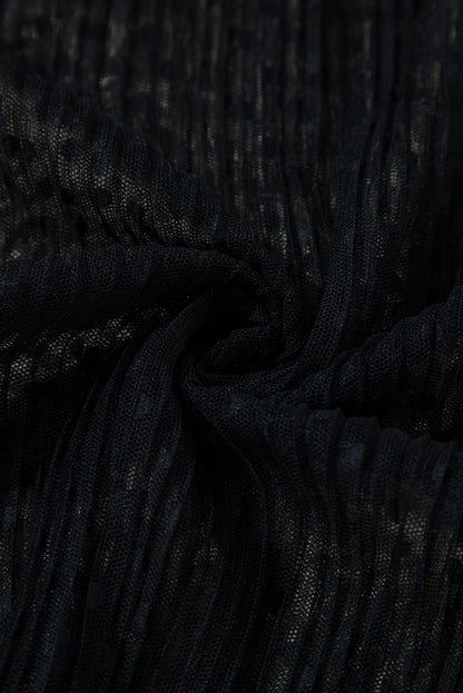 Schwarze Bluse mit transparenter Spitze und Stehkragen und langen Ärmeln