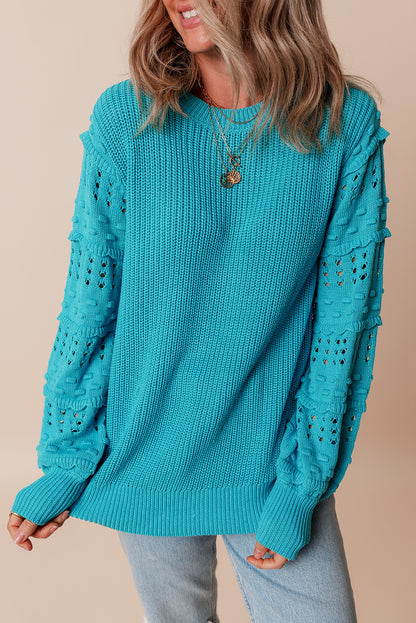 Türkisfarbener Pullover mit gerüschten Ösenärmeln