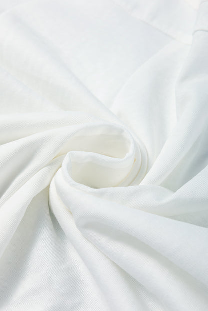 Weißes Top mit Rundhalsausschnitt und Patchwork-Ärmeln im Tropenblatt-Print