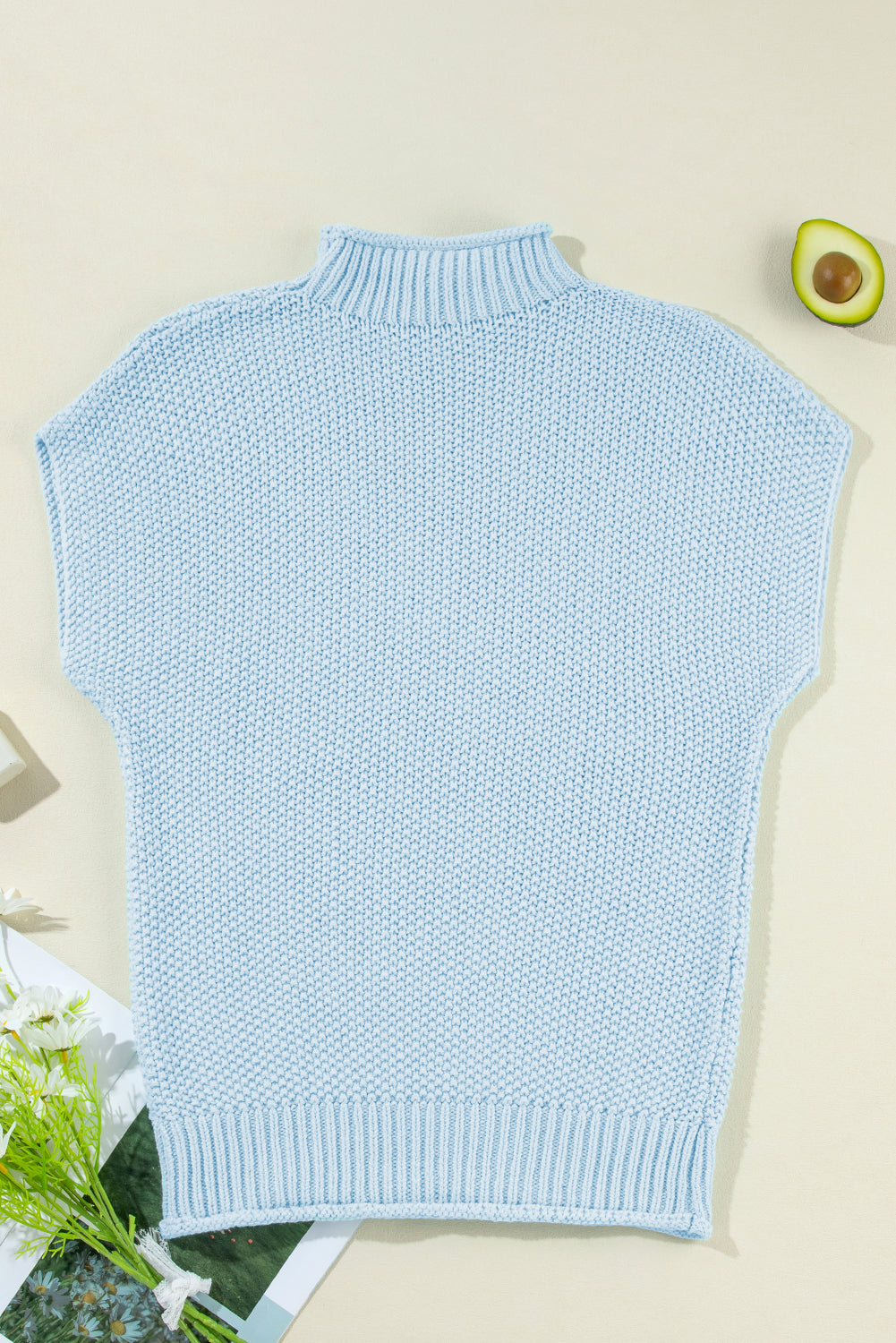 Iceland Blauer Pullover mit hohem Kragen und Fledermausärmeln
