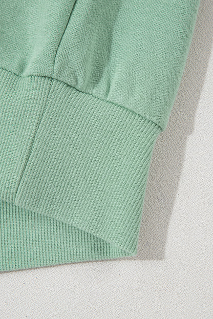Moonlight Jade – Lockeres Sweatshirt mit Regenbogenstreifen an den Ärmeln und Rundhalsausschnitt