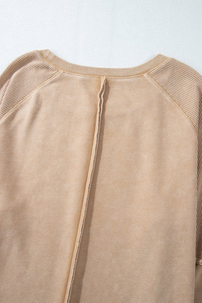 Helles, französisches Beige, einfarbiges Waffelstrick-Patchwork-Sweatshirt mit Raglanärmeln