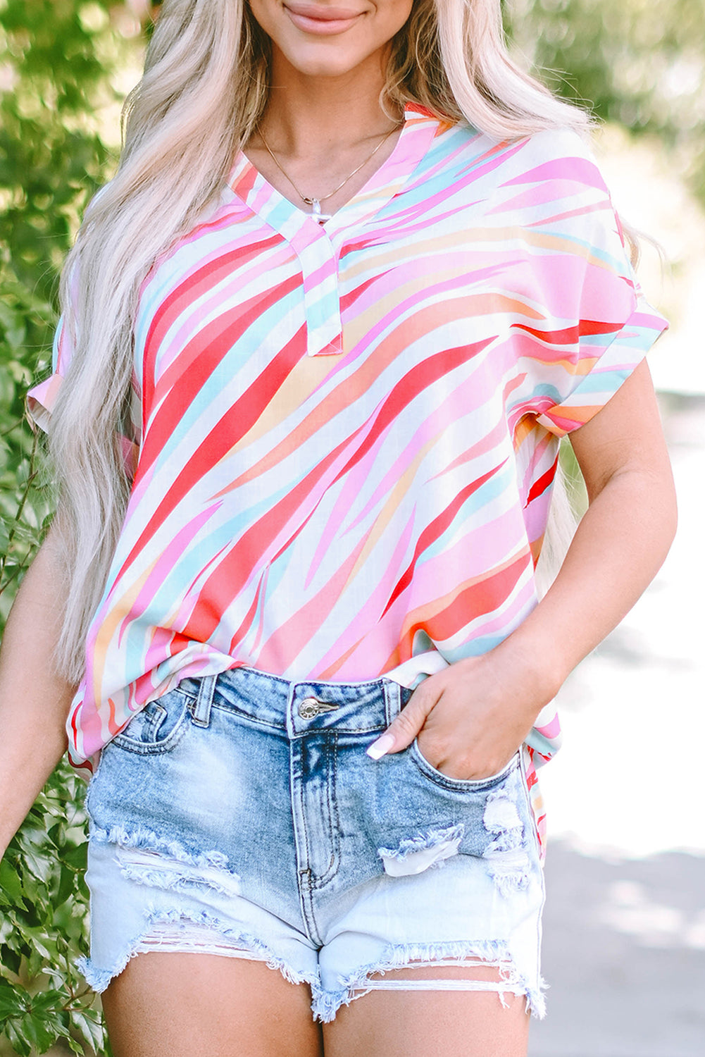 Mehrfarbige Bluse mit abstraktem Print und kurzen Ärmeln