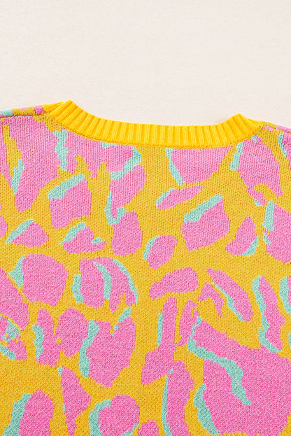 Vitality – Orangefarbener Baggy-Pullover mit abstraktem Print und geripptem Saum