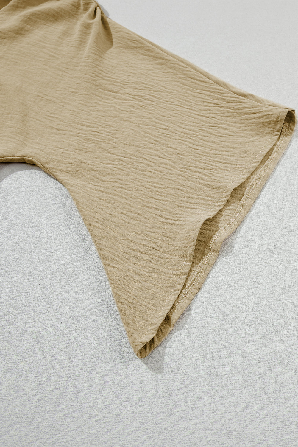 Parchment – Bluse mit V-Ausschnitt und weiten Ärmeln in Knitteroptik