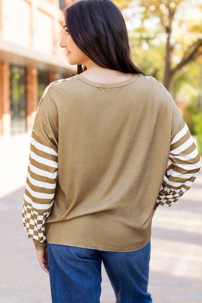 Khakifarbene Bluse mit Schachbrettmuster und Patchwork-Laternenärmeln und Taschen