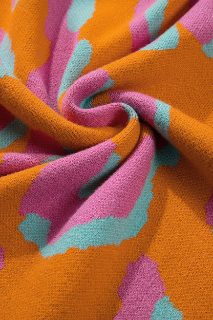 Orangefarbener Pullover mit Leopardenmuster und geripptem Rand im Colorblock-Design