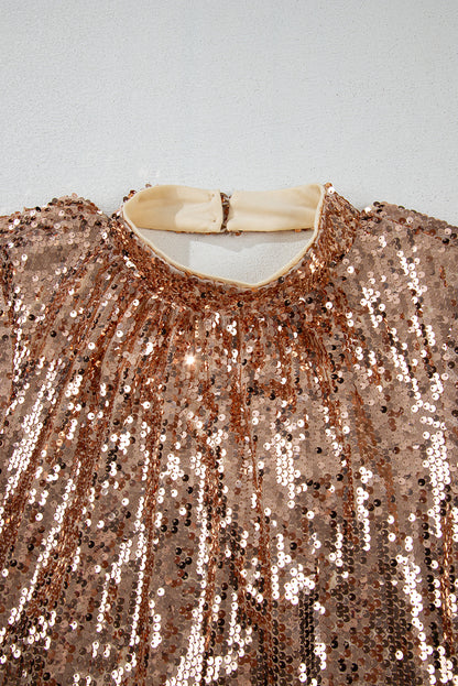 Goldfarbenes, Paillettenbesetztes Minikleid mit langen Ärmeln und Cut-Out am Rücken