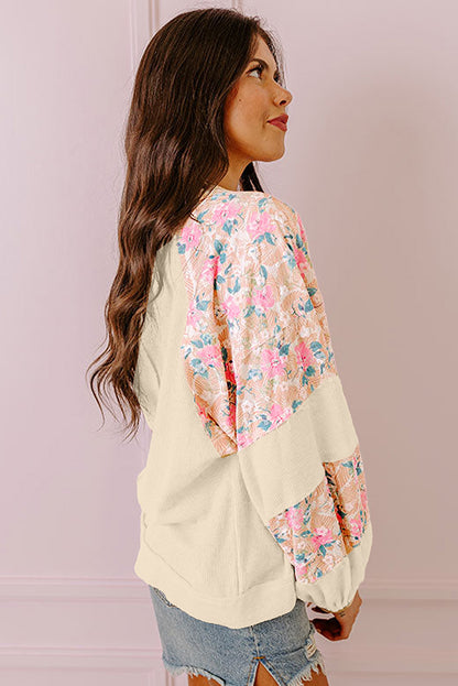 Aprikosenfarbene Bluse mit strukturiertem Patchwork und Ballonärmeln