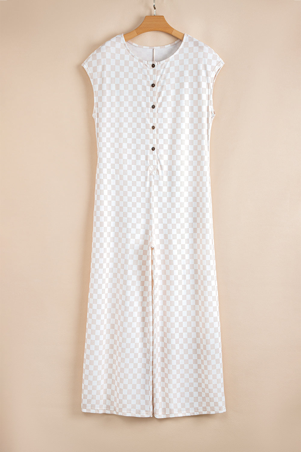 Aprikosenfarbener Jumpsuit mit weitem Bein und Karomuster, Rundhalsausschnitt und Knöpfen