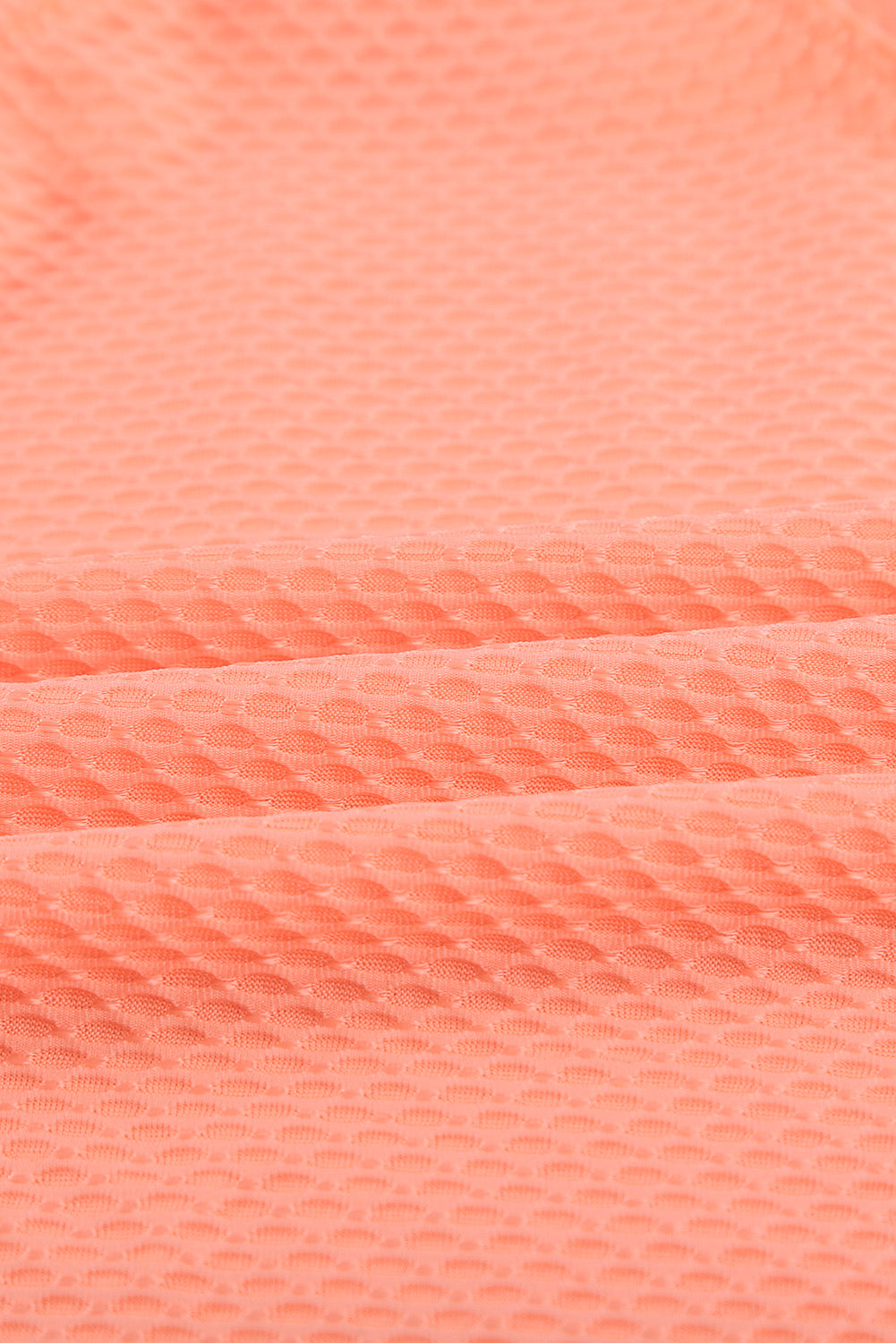 Orangefarbener bedruckter Racerback-Tankini mit Spleißmuster
