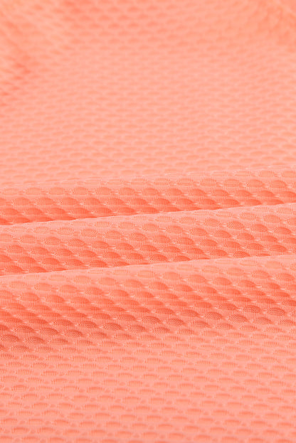 Orangefarbener bedruckter Racerback-Tankini mit Spleißmuster