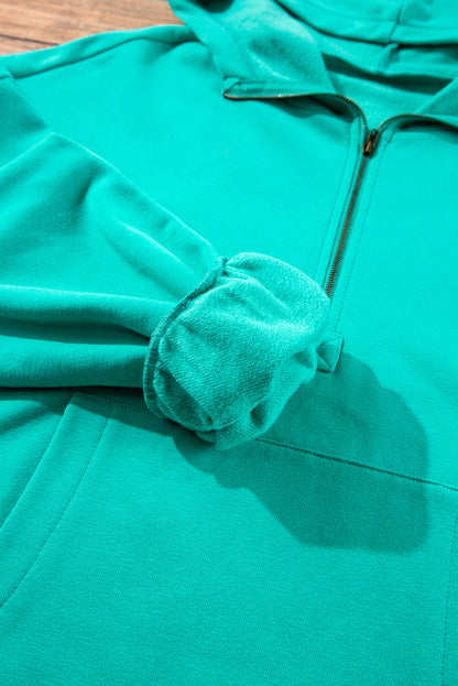 Aruba Blauer, lockerer Hoodie mit Fleecefutter und Kängurutaschen mit halbem Reißverschluss
