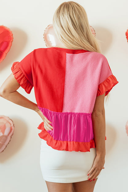 Tomatenroter, gestrickter Patchwork-Pullover mit Rüschenbesatz