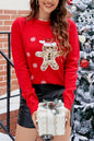 Roter Rundhalspullover mit Pailletten und Weihnachtsmuster
