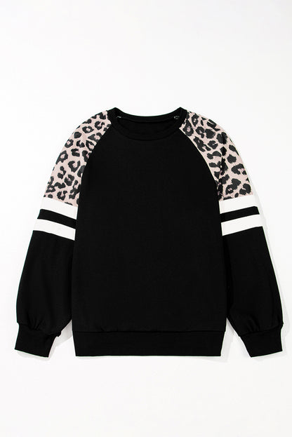 Schwarzes Sweatshirt mit Raglanärmeln und Farbblockdesign mit Leopardenmuster