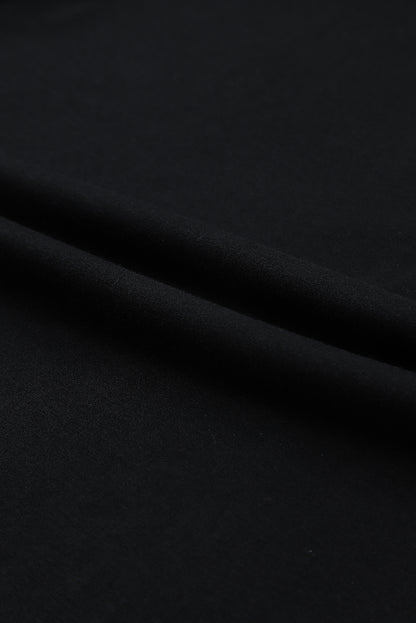 Schwarzes Kleid mit Knopfleiste und hoher Taille und langen Ärmeln