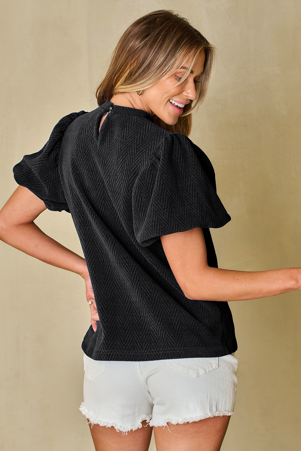 Schwarze Bluse mit Stehkragen und Puffärmeln