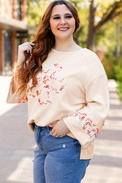 Beiges Plus Size Top mit Rundhalsausschnitt und Blumenpatches